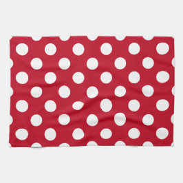 Vitt polka dots på rött kökshandduk