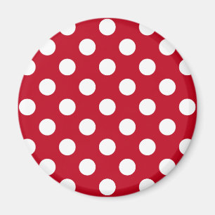 Vitt polka dots på rött magnet