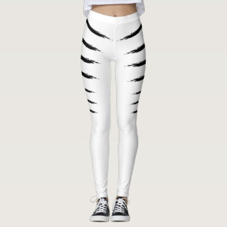 Vittigern görar randig damasker leggings