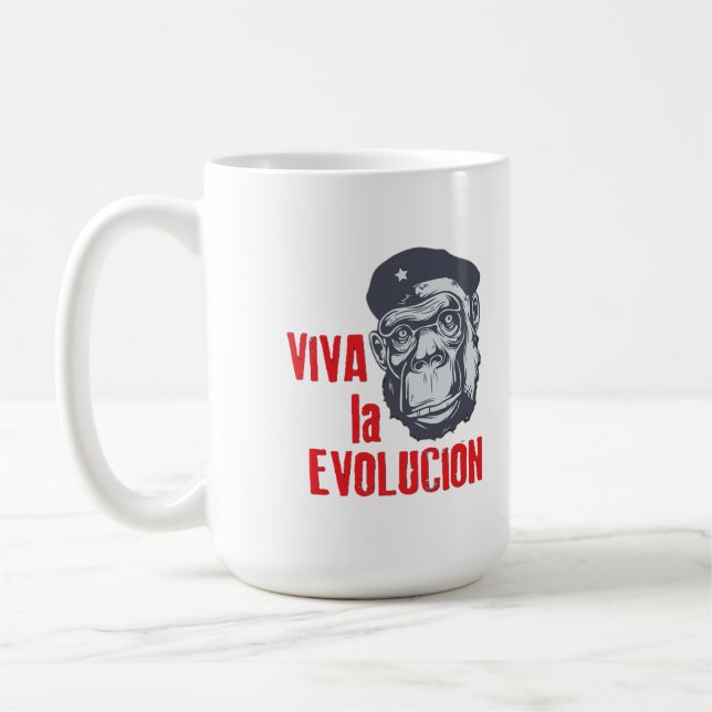 "Viva la Evolucion" (Long Live Evolution). Kaffemugg (Vänster)