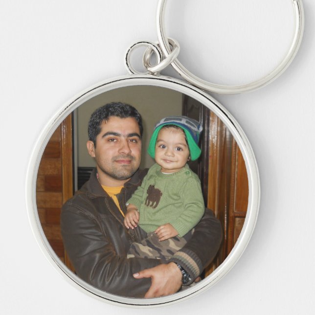 Vivaan med Chachu Rund Silverfärgad Nyckelring (Framsidan)