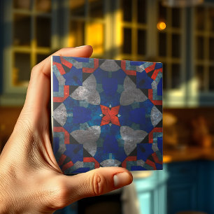 Vivid Red Starburst med mjuka blå detaljer Kakelplatta