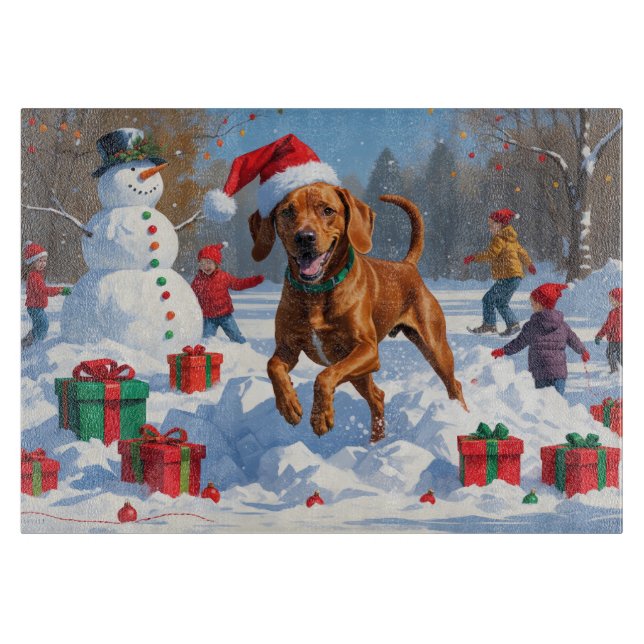 Vizsla springar i snö med julhatt (Framsidan)