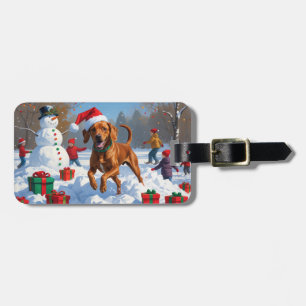 Vizsla springer i snö med julhatt bagagebricka