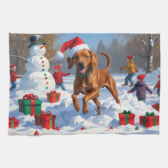 Vizsla springer i snö med julhatt kökshandduk (Horisontell)
