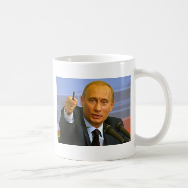 Vladimir Putin önskar att ge sig som bemannar en Kaffemugg (Höger)