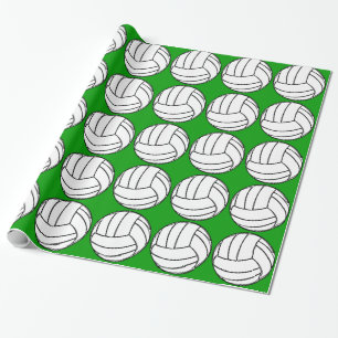 Volleybollar på grönt presentpapper