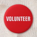 Volontärknapp - röd och vit knapp<br><div class="desc">Den röda och vita "Volunteer"-knapp som knackar på. Använda den här märkrn för företag,  skola,  välgörenhet,  evenemang osv.</div>