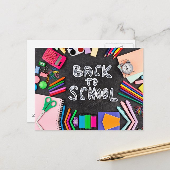 vykort för back to school (A colorful arrangement of school supplies surrounding a chalkboard background.  
 )