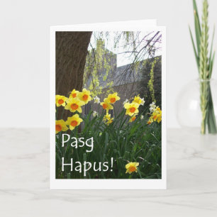 Walesiskt påskkort med påskliljar och kyrkan helgkort