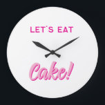 Wall Clock Stor Klocka<br><div class="desc">Add a sprinkle of sweetness to your space with this fun and playful wall clock! Featuring bold, pink typography and the delicious phrase “LET’S EAT Cake!”, this design is perfect for kitchens, dining rooms, cafés, or anywhere you want to serve up some joy. Whether you're a dessert lover, a baking...</div>