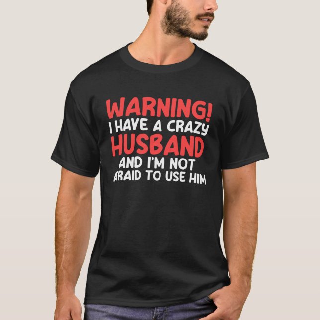 warning I have a crazy husband and I'm not afraid  T Shirt (Framsida)