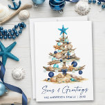 Watercolor Coastal Tree Seas and Greetings Beach Julkort<br><div class="desc">Modern Minimalist Elegance Calligraphy Ink Pen Handwritten Script Seas & Greetings Coastal Holiday Card includes a Watercolor Christmas Tree make of beach ocean driftwood,  seashells,  sand dollars,  nautical anchor ornament and topped with a starfish. Navy Blue Text.</div>