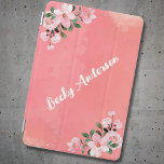 Watercolor Floral Pink on Peach  iPad Mini Skydd<br><div class="desc">Orange-red watercolor background. Pink flower elements in the corners. Your text or name in handwritten font at a 45 degree angle and in almost white color.</div>