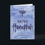 Watercolor Menorah Foldad Hanukkah-kort Helgkort<br><div class="desc">En tvätta med vattentblått fungerar som en subtil bakgrund för den här textade menorahillustrationen och den blyga, handskrivna texten från Lycklig Hanukkah. Glöm inte att anpassa framsidan med din namntext. Lägg till ett personligt tryck på insidan av det här vikta kortet med alternativen "anpassa det" och ändra allt från teckensnittet...</div>