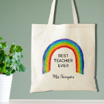 Watercolor Rainbow Teacher Tack Gift Tygkasse<br><div class="desc">Lärarens Tote-väska är dekorerad med en barnlik regnbåge och ord Best Teacher nånsin. Anpassade enkelt med din favoritlärares namn.</div>