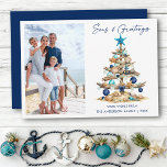 Watercolor Tree Seas and Greetings Photo Beach Julkort<br><div class="desc">Modern Minimalist Elegance Calligraphy Ink Pen Handwritten Script Seas & Greetings Coastal Holiday Card includes a Watercolor Christmas Tree make of beach ocean driftwood,  seashells,  sand dollars,  nautical anchor ornament and topped with a starfish. Navy Blue Text. Photo Front.</div>