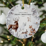 Watercolor Winter Woodland Wildlife 1:a jul Julgransprydnad Keramik<br><div class="desc">Behåll prydnaden "Första jul". Vår design har en vattenfärgssnö i botaniskt bladverk ram med realistiska vattenfärgsdjur (hjort,  räv,  hare,  snö räv,  uggla och rån),  namn och år.</div>