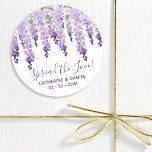 Watercolor Wisteria Bröllop Spread the Kärlek Scri Runt Klistermärke<br><div class="desc">Watercolor Wisteria Bröllop Spread Kärlek Script Favor Tags innehåller elegant vattenfärgsblommor i mjuk lavender och lila med grönt löv på vit bakgrund med bröllop tackmeddelandet och datumet nedan. På motsatt sida finns ett mjukt lock. Anpassa genom att redigera texten i textrutorna. Designad för dig av Evco Studio www.zazzle.com/store/evcostudio</div>