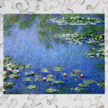 Waterlilies av Claude Monet, Vintage Fine Art Pussel<br><div class="desc">Claude Monets vattenlilies är en vintage bra konstmålning med vattendroppar i en damm i Monets trädgård i hans hem i Giverny, Frankrike. En solig vår eller sommardag med det ljusa blå himmel som reflekterar i dammen. Claude Monet tyckte om att måla "en plein luft" eller "på öppet luft". En serie...</div>