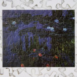 Waterlilies av Claude Monet, Vintage Impressionism Pussel<br><div class="desc">Waterlilies (1915) av Claude Monet är en vintage intsionistisk bra art naturmålning. De mörkare tonerna antyder att han målade detta mästerverk på natten. En av många vatten liljerar målningar som Monet målade av dammen i sin vår-blomsterträdgård i Giverny, Frankrike. Om konstnären: Claude Monet (1840-1926) var en av grundarna av den...</div>