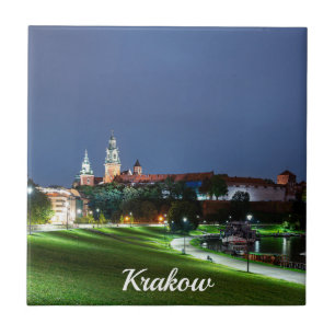 Wawel castle på natten i Krakow, Polen Kakelplatta