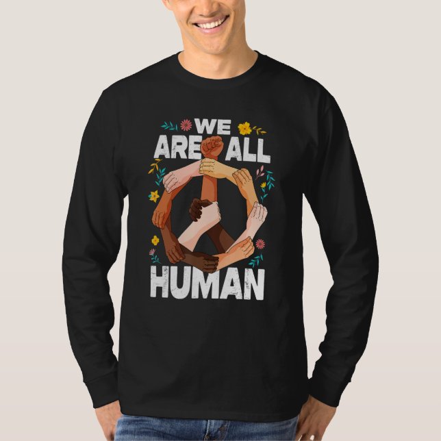 We Are All Human Fist Hands African American Black T Shirt (Framsida)