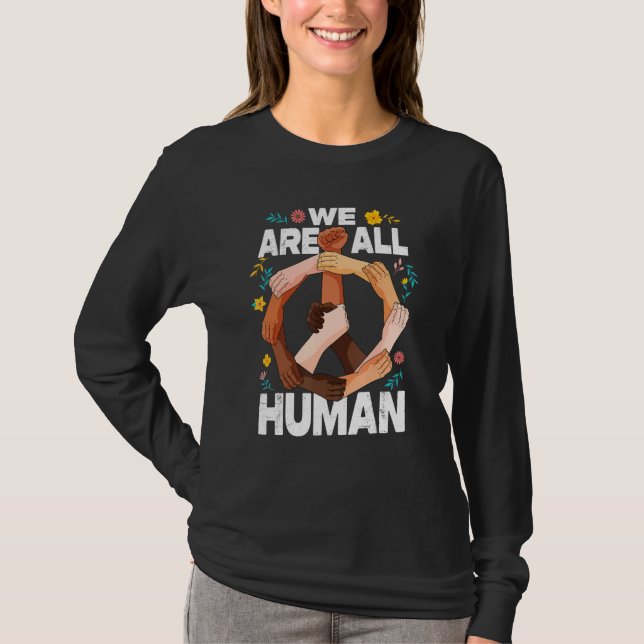 We Are All Human Fist Hands African American Black T Shirt (Framsida)