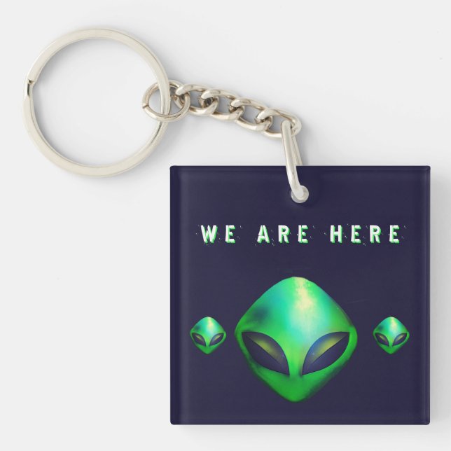 "We Are Here" Green Alien head (Framsidan)