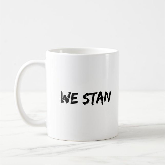 WE STAN Coola Funny Typo Black Writing Kaffemugg (Vänster)
