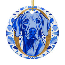 Weimaraner som tittar genom bokstaven "O" i Guld