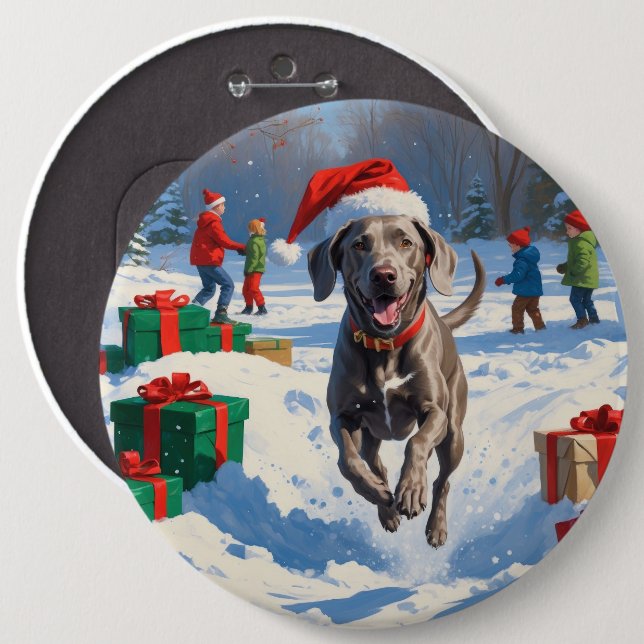 Weimaraner springer i snö med julhatt knapp (Framsida & baksida)