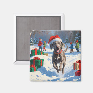 Weimaraner springer i snö med julhatt magnet