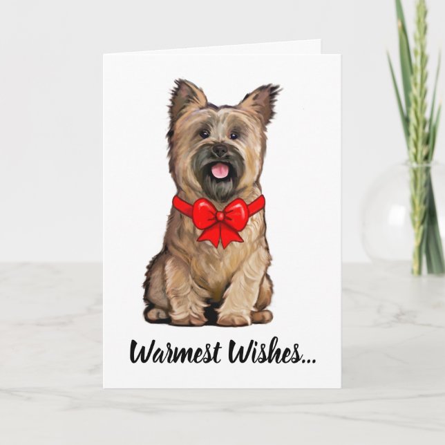 Wheaten Cairn Terrier som bär en julbåge Kort (Framsida)