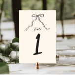 Whimisky Quirky Handwrite Bow Bordsnummer<br><div class="desc">Bordsnummer av vimatisk möhippa med ett vackert handdraget båge i en roligt och ett lekfullt stil,  åtföljt av ett avslappnad,  handskrivet typsnitt som perfekt fångar upphetsningen och glädjen i tillfälle. Välkomsttecknet kommer in i ett program för mörk av skogarna i neutralt färg på grått på ecu.</div>
