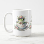 Whimissisk groda i Blommigt Tekopp Kaffemugg<br><div class="desc">En charmerande grönt grodpeppar kommer ut ur ett känsligt porslin tekopp, försedd med mjuka blommar i rosa och guld, krökt med en andedräkt av pastellblommigtar och ett litet royal krona. Den här fantastiska scenen blandar sagolika stollig med kottagecore elegance, och framkallar mjuk nostalgi och lekfull storybook-vibes. Den här söta kompositionen...</div>