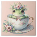 Whimissisk groda i Blommigt Tekopp Kakelplatta<br><div class="desc">En charmerande grönt grodpeppar kommer ut ur ett känsligt porslin tekopp, försedd med mjuka blommar i rosa och guld, krökt med en andedräkt av pastellblommigtar och ett litet royal krona. Den här fantastiska scenen blandar sagolika stollig med kottagecore elegance, och framkallar mjuk nostalgi och lekfull storybook-vibes. Den här söta kompositionen...</div>