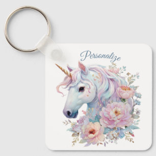 Whimsical Enhörning med Pastell Färgade Blommotiv Nyckelring