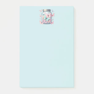 Whimsical fjärilar i en burk post-it block