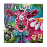 Whimsical Floral Cow Pink Teal Black Personalized Kakelplatta<br><div class="desc">Cows symbolize nurturing care,  feminine strength,  and sacred abundance. They represent motherhood,  patience,  and harmony with nature,  often revered as gentle providers of life’s sustenance. Across cultures,  they embody devotion,  resilience,  and the quiet power of earth-connected grace.</div>