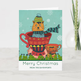 Whimsical katt som sitter i en tekopp jul kort
