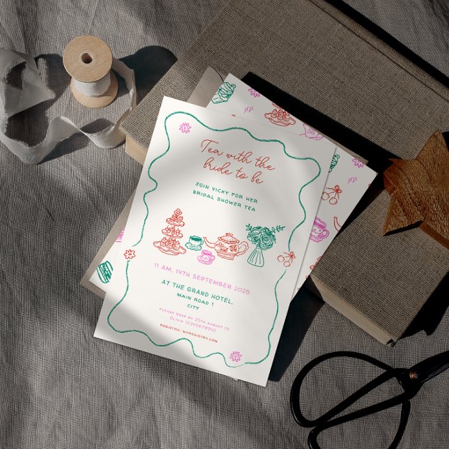Whimsique Hand plockade Tea Party Möhippa Inbjudningar (hand drawn bridal shower tea party invitation with hand written font resting on a book.)
