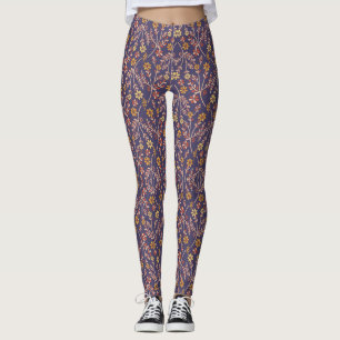 Whimsisk blomsterdesign med vinrankor på lila bakg leggings
