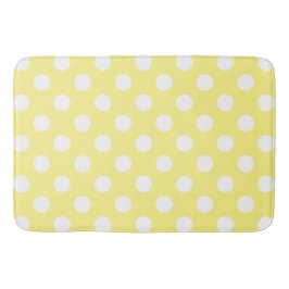 White polka dots om citrongulten badrumsmatta