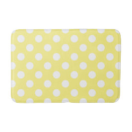 White polka dots om citrongulten badrumsmatta