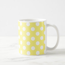 White polka dots om citrongulten kaffemugg