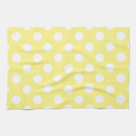 White polka dots om citrongulten kökshandduk