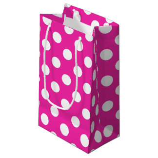 White polka dots on fuchsia