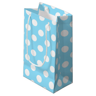 White polka dots på blek blue