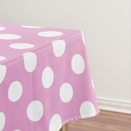 White polka dots på blekens rosa
